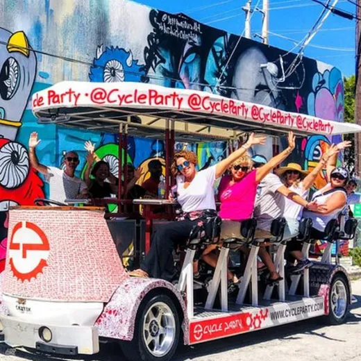 Riders on a Cycle Party pedal bar